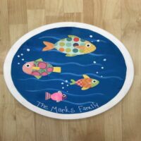 Family Fish on Wood